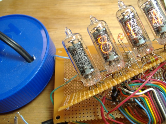 Closeup of the NIXIE tubes on the clock's display.