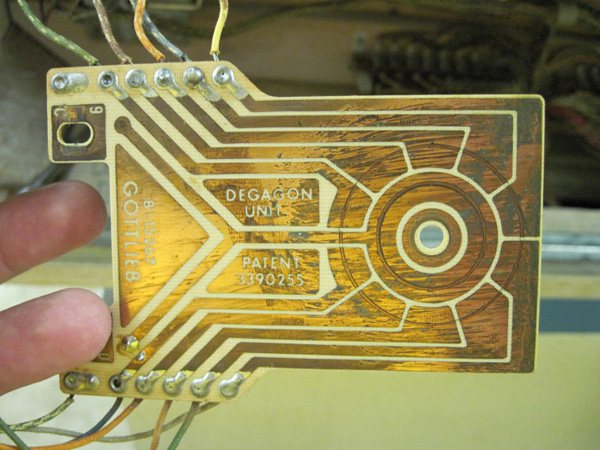 The printed circuit board inside the score reels.