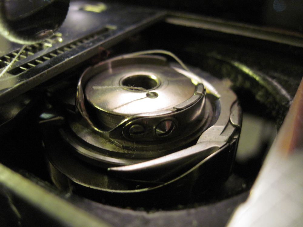 A closeup of the rotary hook mechanism.